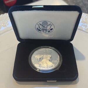 Silver Coin in Display Case